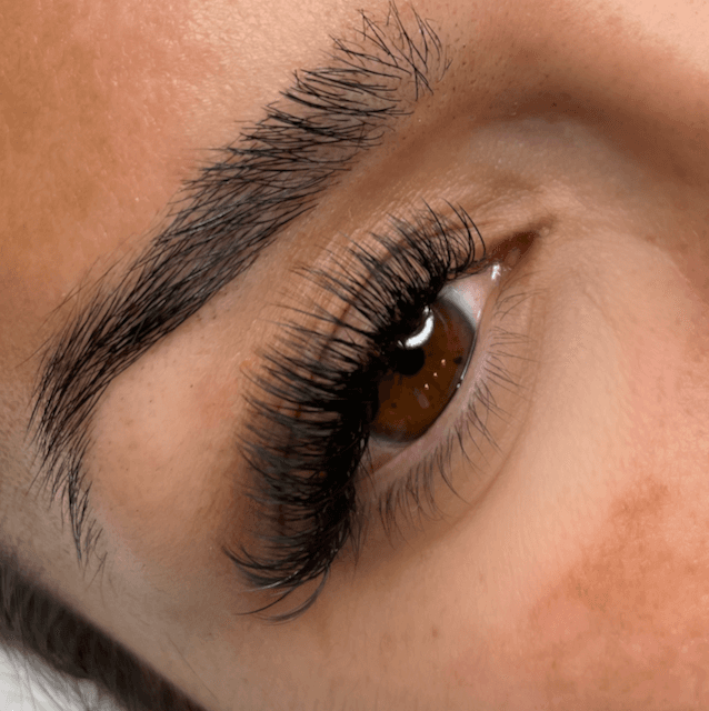 Lash extensions portfolio - Photo of eye of a hybrid lash set. in San Diego