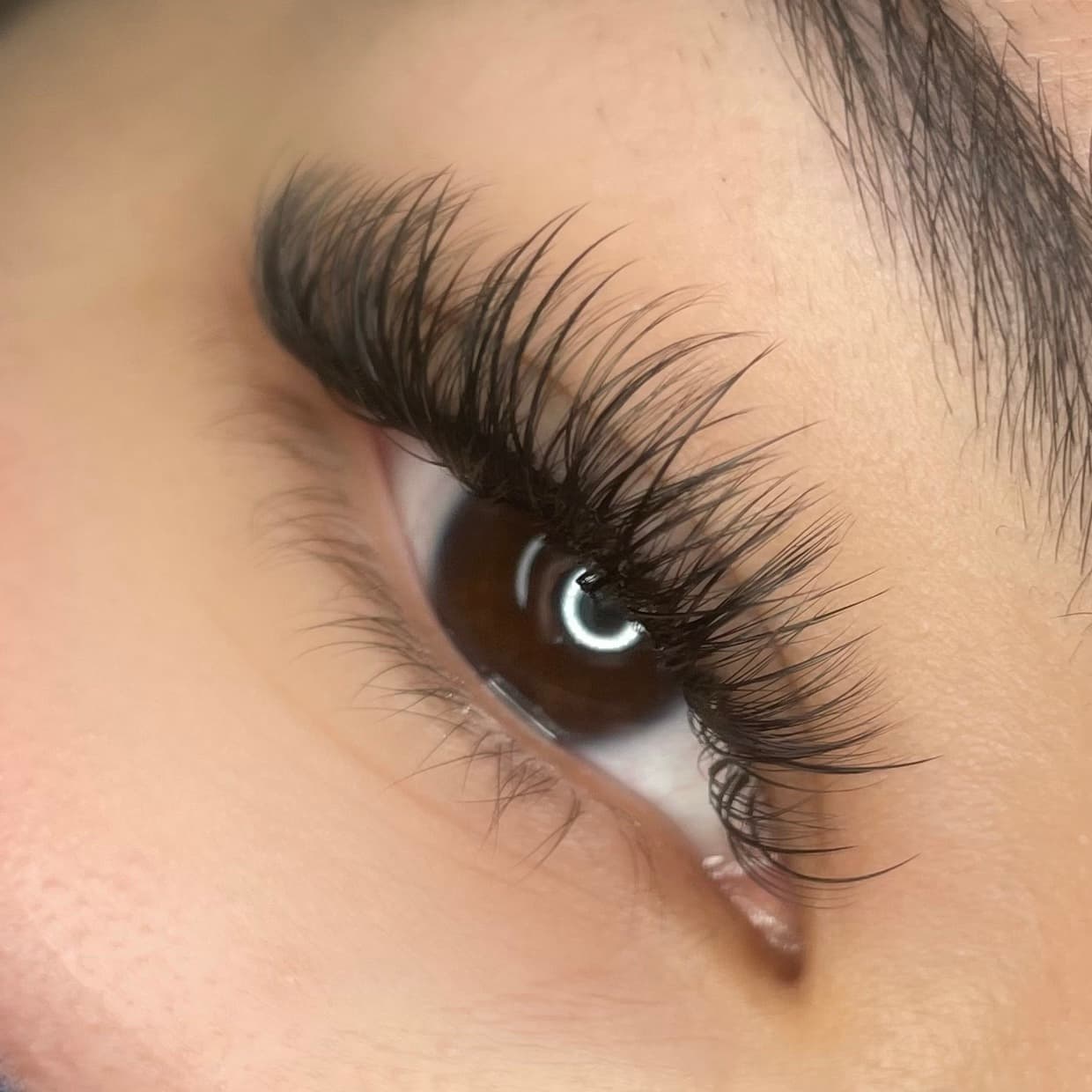 Lash extensions portfolio - Soft, textured hybrid lash set. in San Diego